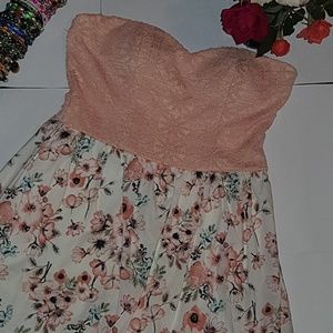 Baby pink strapless floral dress.